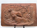 Wooden handarved relief of setters