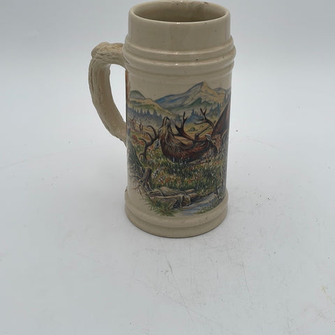 Fighting stag antique beer stein