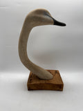 carved swan head