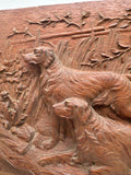 Wooden handarved relief of setters